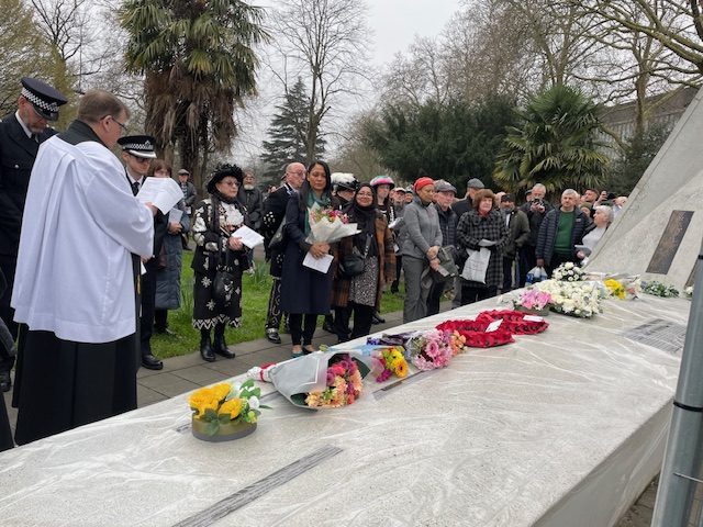 Chris & crowd at memorial Chris & crowd at memorial